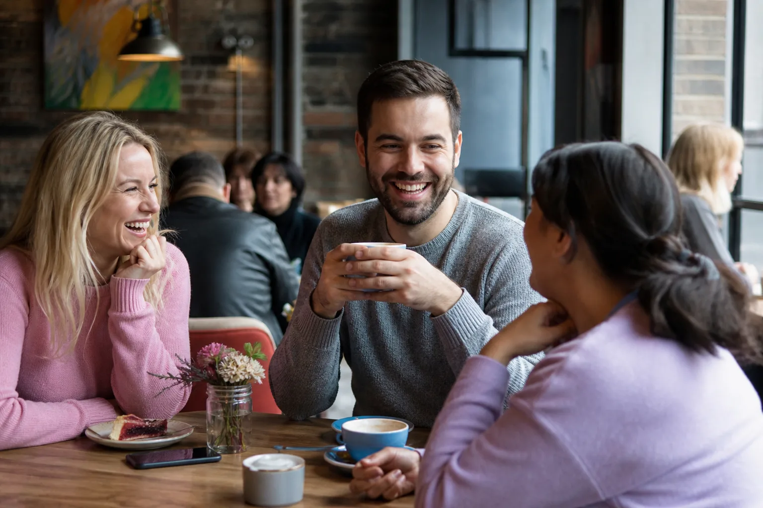 A couple talking over coffee in a Yorkshire café